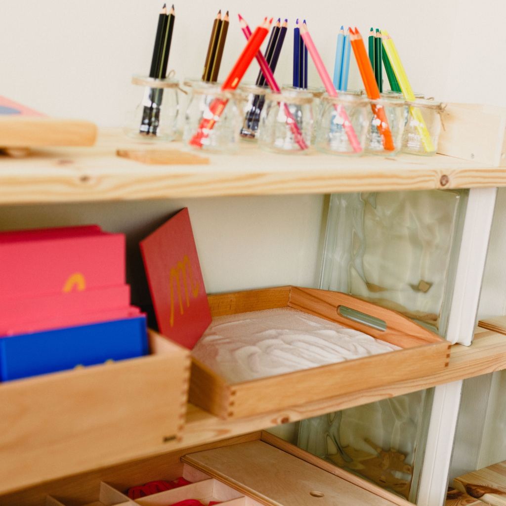 Montessori Sandpaper Letters on the Shelf in the Classroom