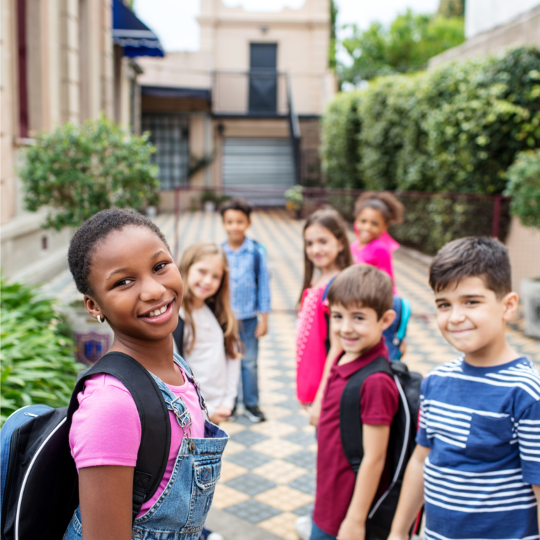 children-waiting-in-line-to-go-back-to-school